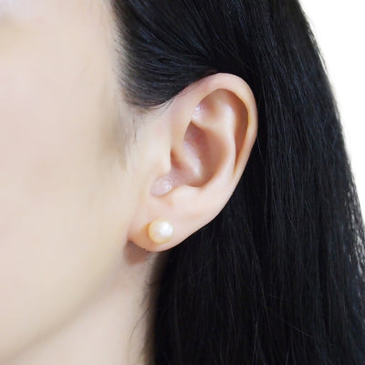 Light orange freshwater pearl invisible clip on stud earrings - miyabigracejewelry.com