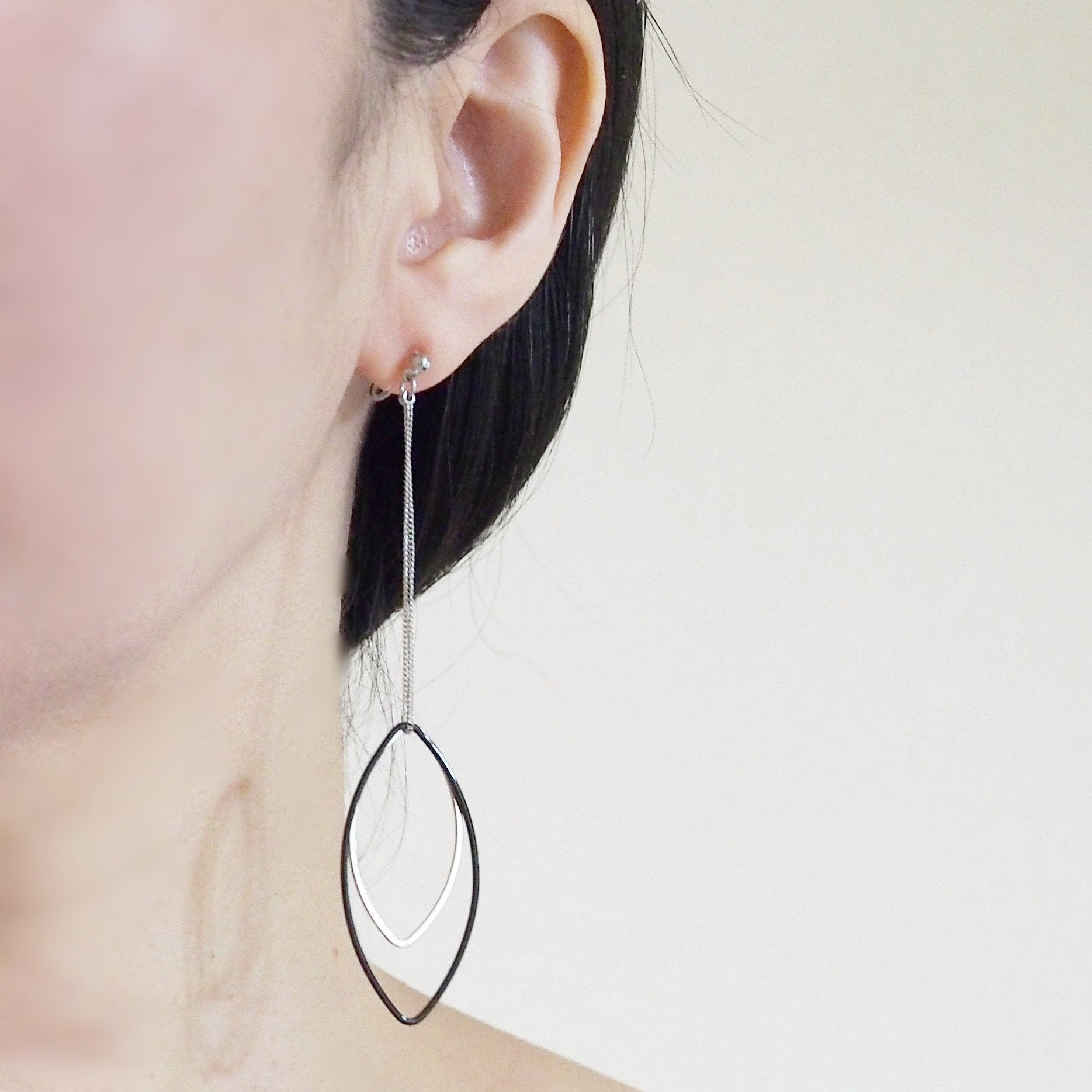 Long silver and black oval hoop invisible clip on earrings - miyabigracejewelry.com