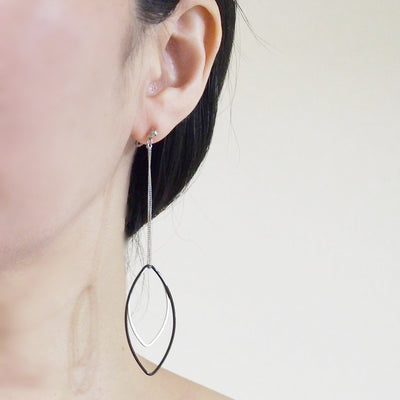 Long silver and black oval hoop invisible clip on earrings - miyabigracejewelry.com