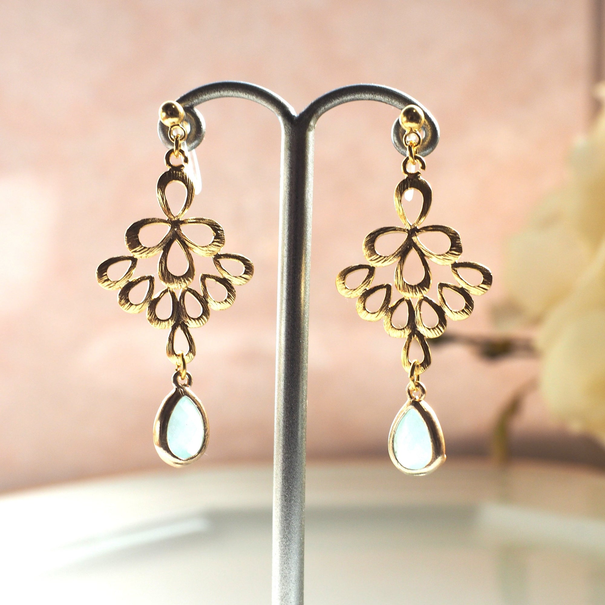 Gold peacock feather with mint green teardrop glass invisible clip on earrings - miyabigracejewelry.com