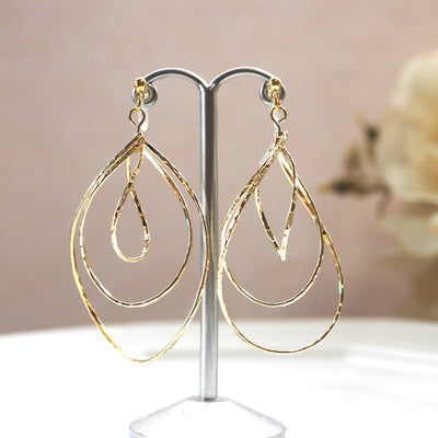 Gold waved hoop invisible clip on earrings - miyabigracejewelry.com